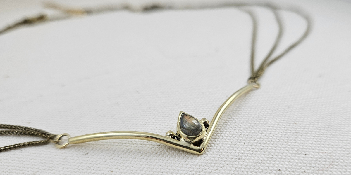 Brass headpiece with chain and central tear drop labradorite stone